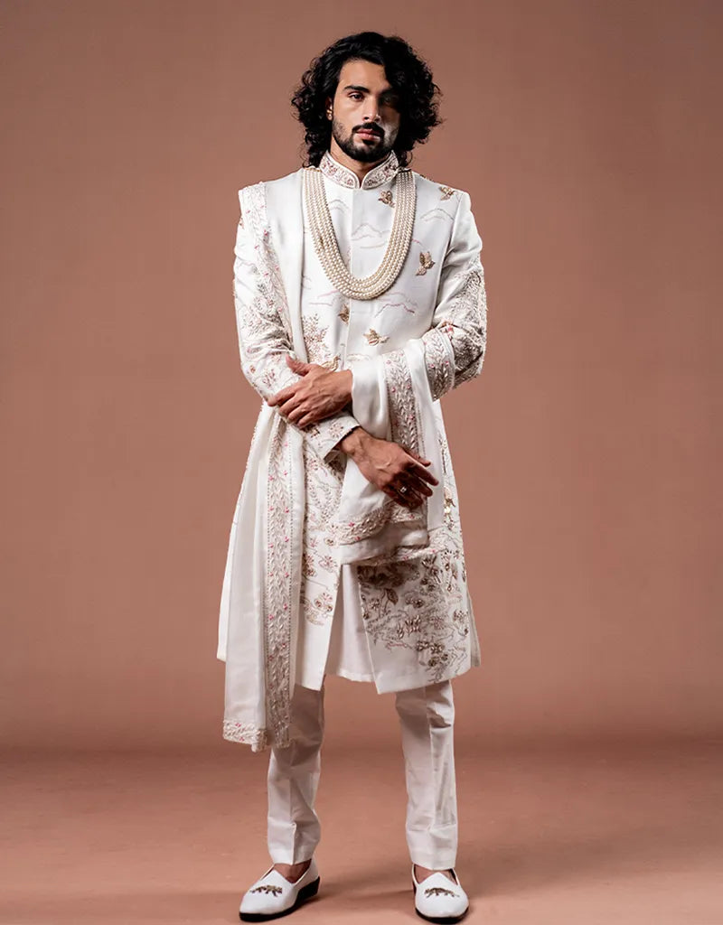 A man wearing the Classic Zardosi Work Sherwani from The HUB.