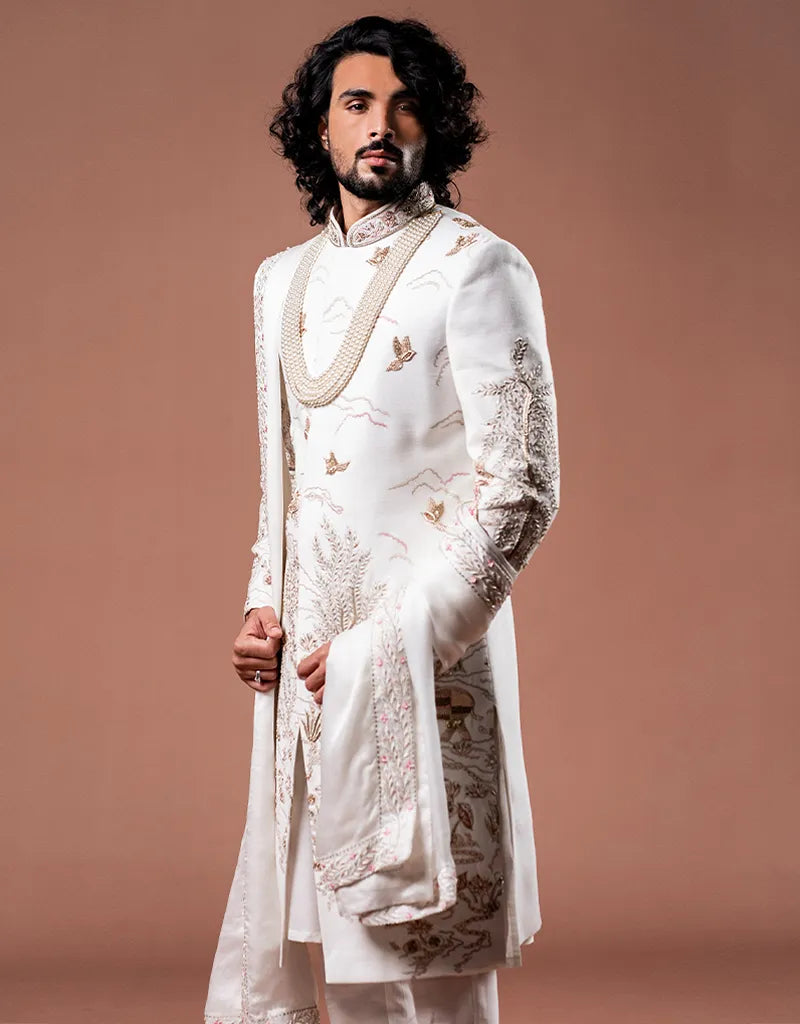 A man wearing the Classic Zardosi Work Sherwani from The HUB.