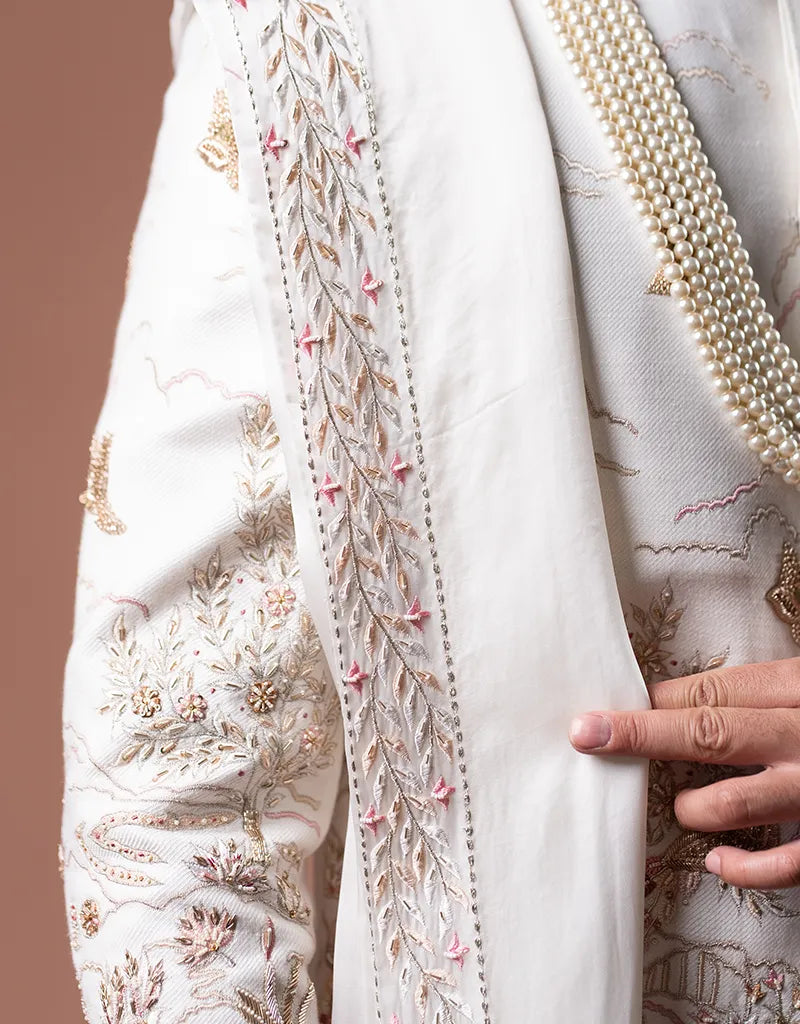 A man wearing the Classic Zardosi Work Sherwani from The HUB.