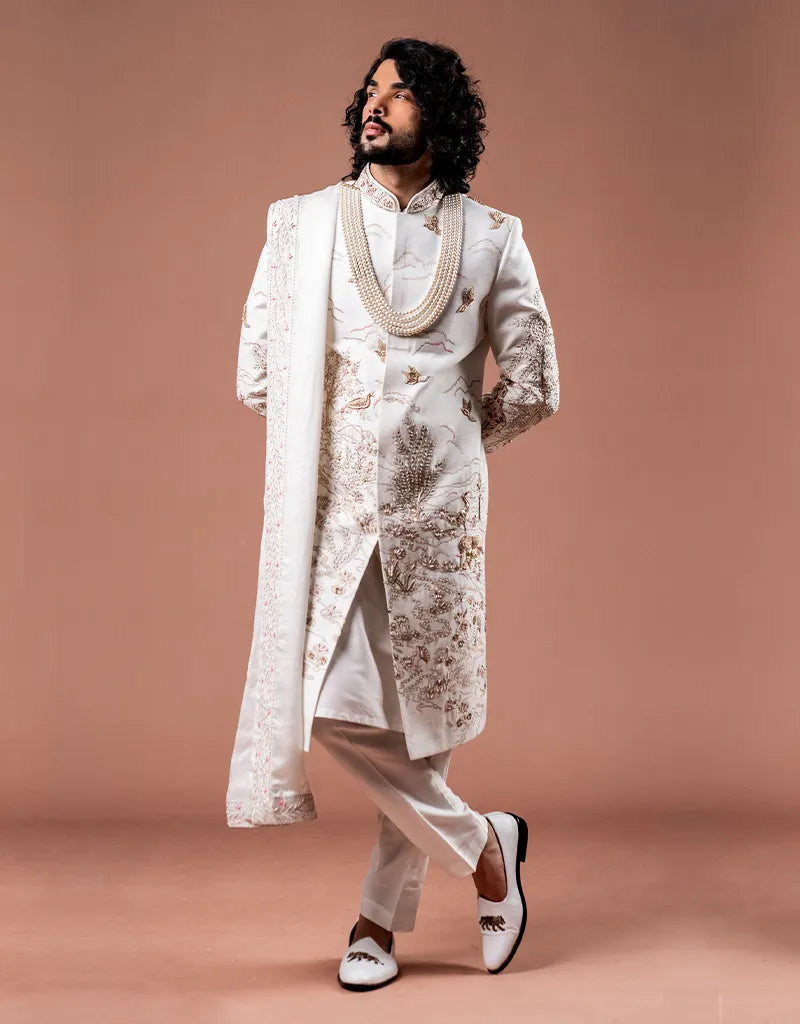 A man wearing the Classic Zardosi Work Sherwani from The HUB.