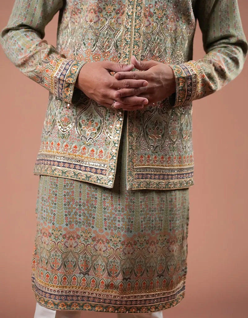 Traditional embroidered Kalamkari Gotta Bandi Kurta Set outfit with a brown background