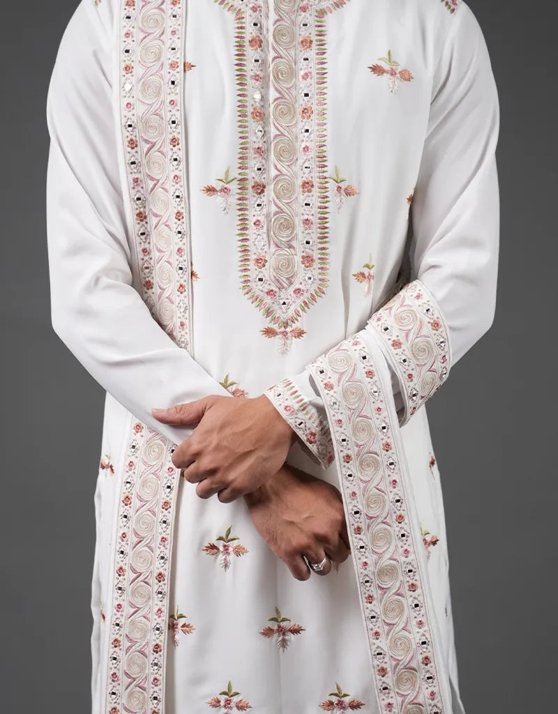 White embroidered Kashmiri Mirror Kurta Set with floral patterns on a plain background