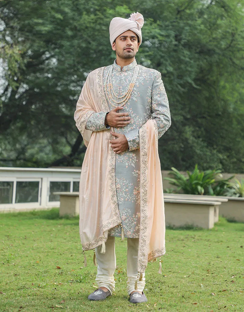 A man wearing Three-piece Sherwani in Raw Silk with Kardana work in Grey from The HUB.