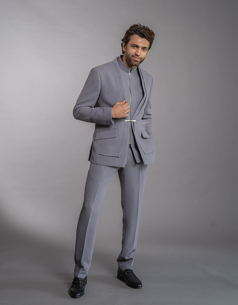 Man wearing a three-piece Jodhpuri suit in the Bandhgala style in grey from The HUB.