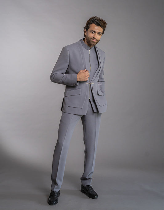 Man wearing a three-piece Jodhpuri suit in the Bandhgala style in grey from The HUB.