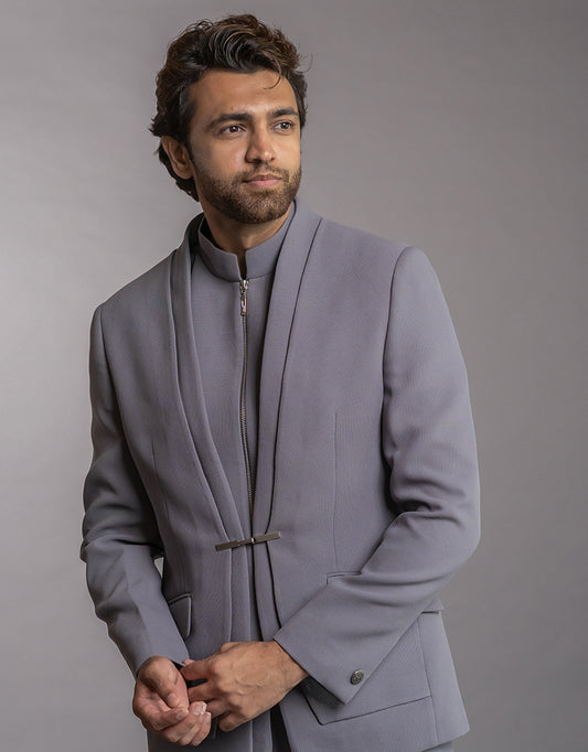 Man wearing a three-piece Jodhpuri suit in the Bandhgala style in grey from The HUB.