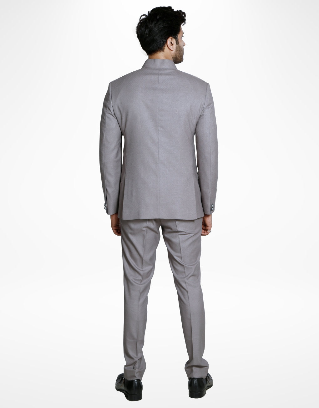 Man wearing a two-piece imported Tr Jodhpuri suit in grey from The HUB.