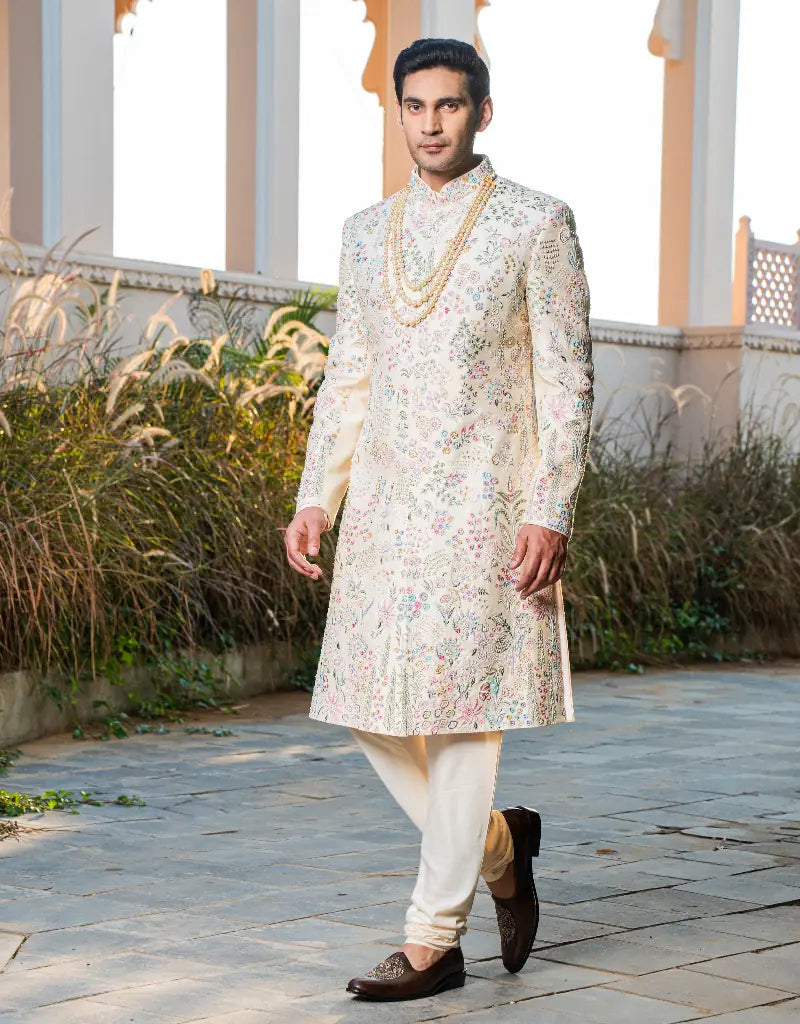 A man wearing a floral work sherwani from The HUB.