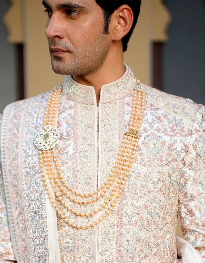 A man wearing an Imperial Brocade Sherwani from The HUB.